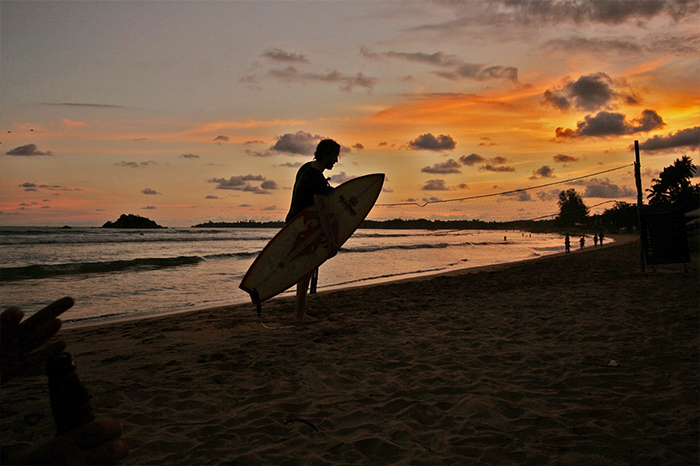 Surfing Welligama beach